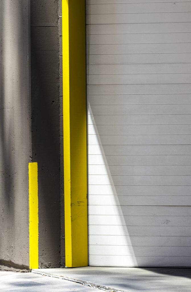 Downtown Denver: lined garage door with yellow columns