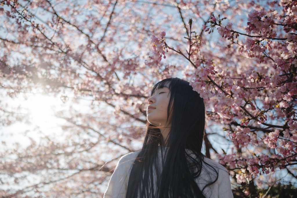 Portrait with cherry blossoms taken with the Sigma: 17-40mm F1.8 DC Art